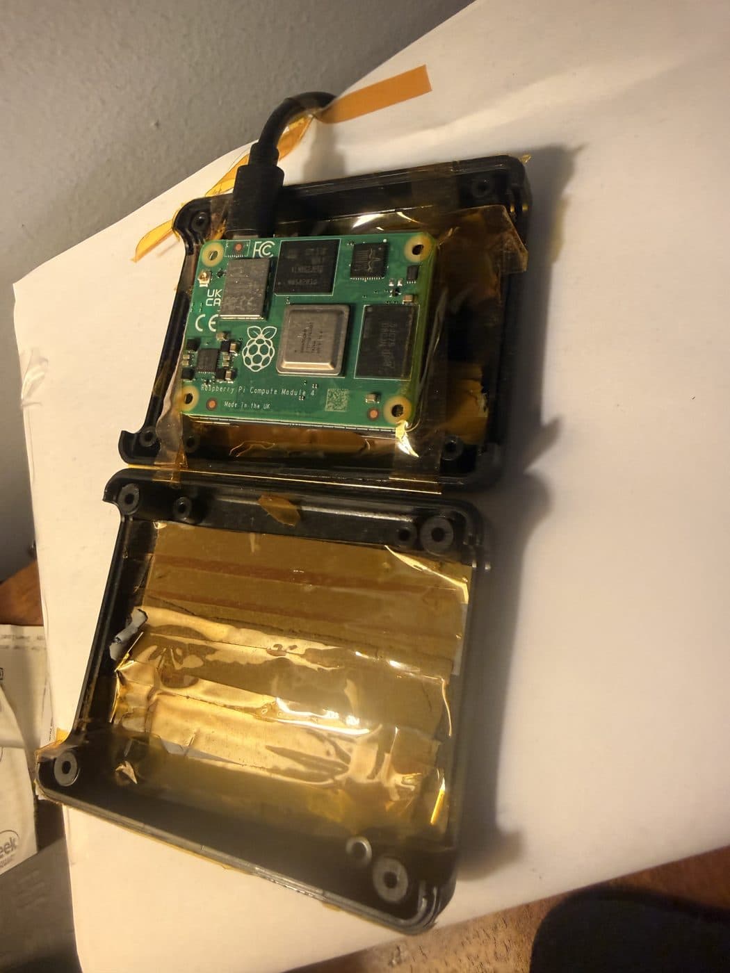 The CM4 in its first enclosure, battery underneath.